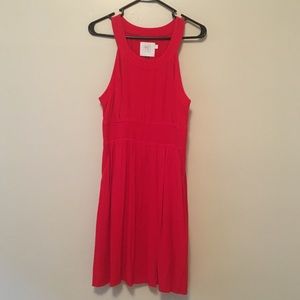 Red high necked, defined waist dress
